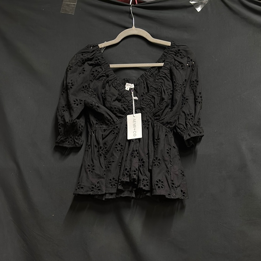 Chic Black Smocked Blouse with Ruffled 3/4 Sleeves